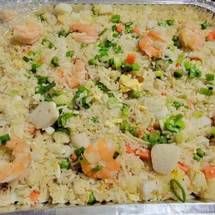 Small party tray of fried rice. ($35 as of 2022) Very good.