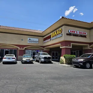 cars parked in front of a restaurant