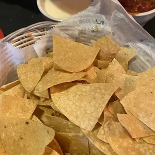 Chips with cheese dip and what we believe to be jar salsa and not home made.