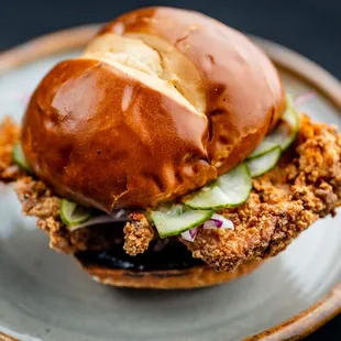 a fried chicken sandwich on a plate