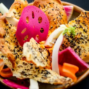a bowl of food with a smiley face on it