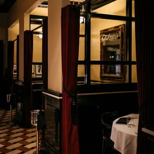 a restaurant with a checkered floor