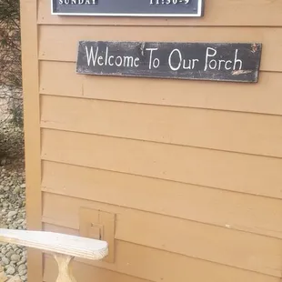 Outside sign, hours of business