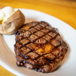 16 ounce Ribeye. Hand cut everyday. Add an extra ounce or ounces if desired.