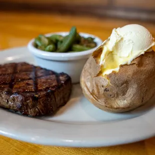 6 ounce hand cut sirloin. Baked potato and green beans.