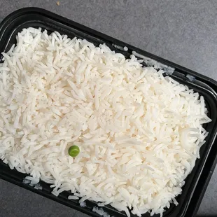 a container of rice and peas