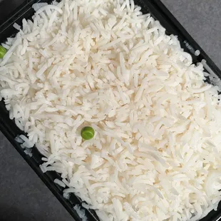 a container of rice and peas