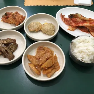 Banchan. Bottom left brown thing was bomb. No clue what it was. Some kind of tempura pepper?