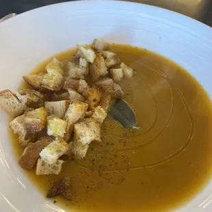 Butternut squash soup drizzled with fresh house made croutons olive oil and pepper