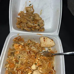 two take out containers of food