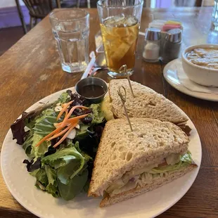 Grilled eggplant sandwich with a side salad