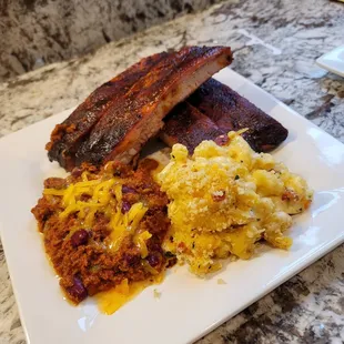 Delicious ribs with sides of ADG Mac n chz and home made chili