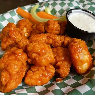 Chunks o' chicken.  Undercooked and over breaded.