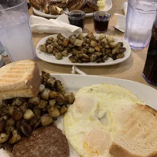 Eggs, sausage, cinnamon swirl French toast, potatoes!