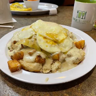 "Brandee's Breakfast: biscuits &amp; gravy, served w/3 eggs, hash browns or home fries &amp; your choice of cheese!