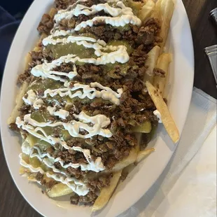 Steak fries with some really good green salsa