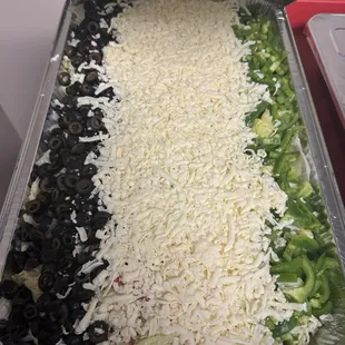 Catering Dinner Salad (20-25 people) = $49.99 (1/26/24) - minus the Red Onion. Love it but stinks up the office.