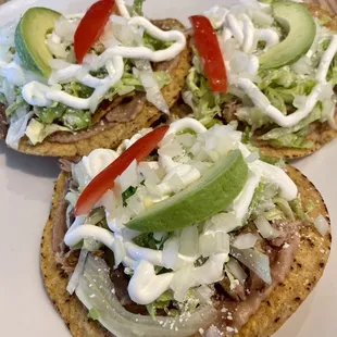 I got tostadas.  These tostadas were so good and crispy. This place is authentic. My waitress didn't even speak English.
