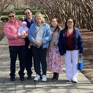 Family photo with the crêpe myrtle arch