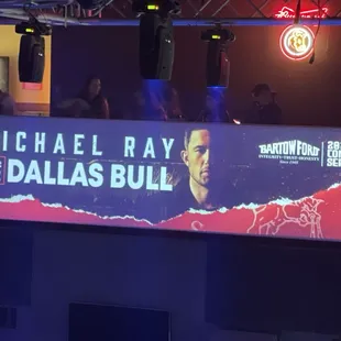 a large billboard with a photo of michael ray