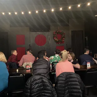 a group of people sitting around a table
