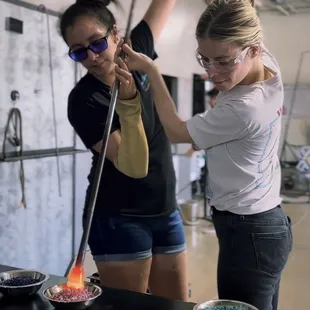 Select your colors and apply to the hot glass