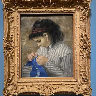 Impressionist exhibit - July 2024 - Artist Pierre-Auguste Renoir (Lise sewing)