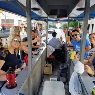 a group of people on a tour bus
