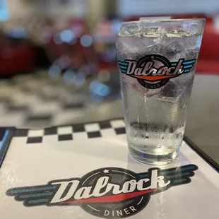 a glass of water on a table