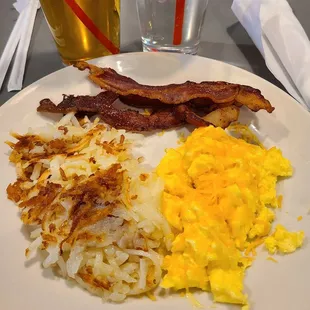 Scrambled eggs w/cheese, hashbrowns, bacon