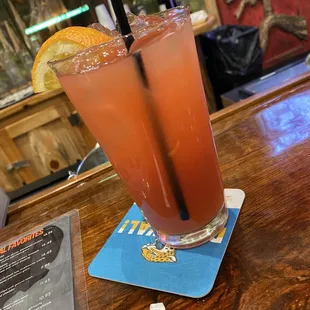 two cocktails on a bar