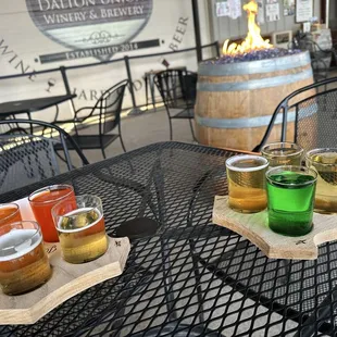 Cider flights on the outdoor Patio. Enclosed with heaters during winter.