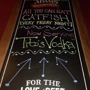 a chalkboard sign for the love of beer