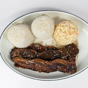 Calbi Ribs Plate at Dalu Hawaiian BBQ! Succulent ribs marinated in our signature Hawaii-inspired sauce, served with macaroni salad and rice