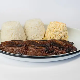 Calbi Ribs Plate at Dalu Hawaiian BBQ! Succulent ribs marinated in our signature Hawaii-inspired sauce, served with macaroni salad and rice