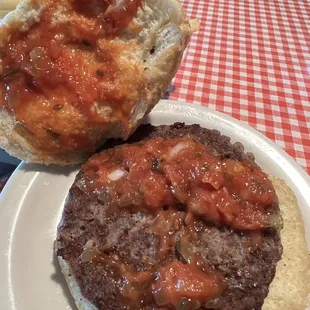 SuperDaly burger showing sauce