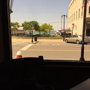 a view of a street from a bus