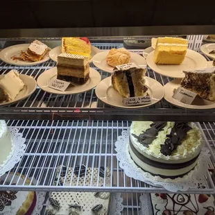a variety of cakes on display