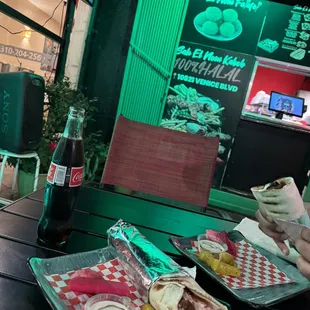 a person eating a sandwich