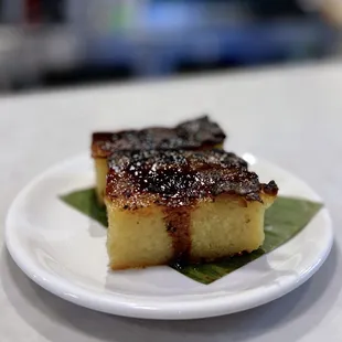 Cassava Bingka Ubi: Flourless cake w/ cassava, eggs, butter, coconut | $6