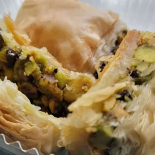 Lightly sweetened baklava stuffed full of pistachios.  Irresistable.