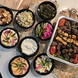 Hummus Grape Leaves Mediterranean Salad White Cabbage Salad Baba Ghanouj Mixed Pickles Mixed Pickles