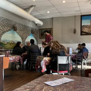 a group of people sitting at a table