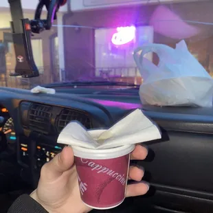 I was given a nice little to-go cup n a napkin to keep from spills.