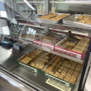 a display case full of baked goods