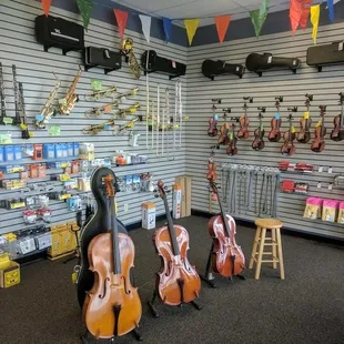 Violins, clarinets, trumpets, flutes, band instruments and cases