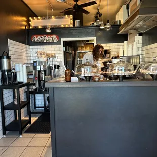a woman working in a coffee shop