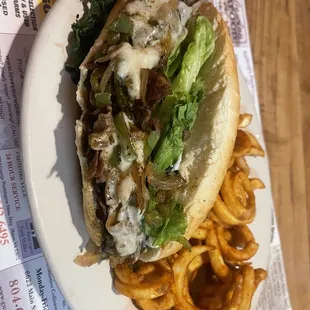 Philly steak and cheese with curly fries