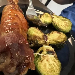 Bacon Wrapped Hog Wing and Brussels Sprouts appetizers.