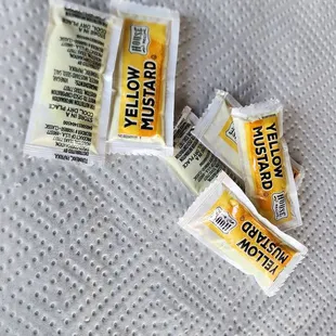 Ketchup in a bottle mustard in awful packets... No love of the mustard users!